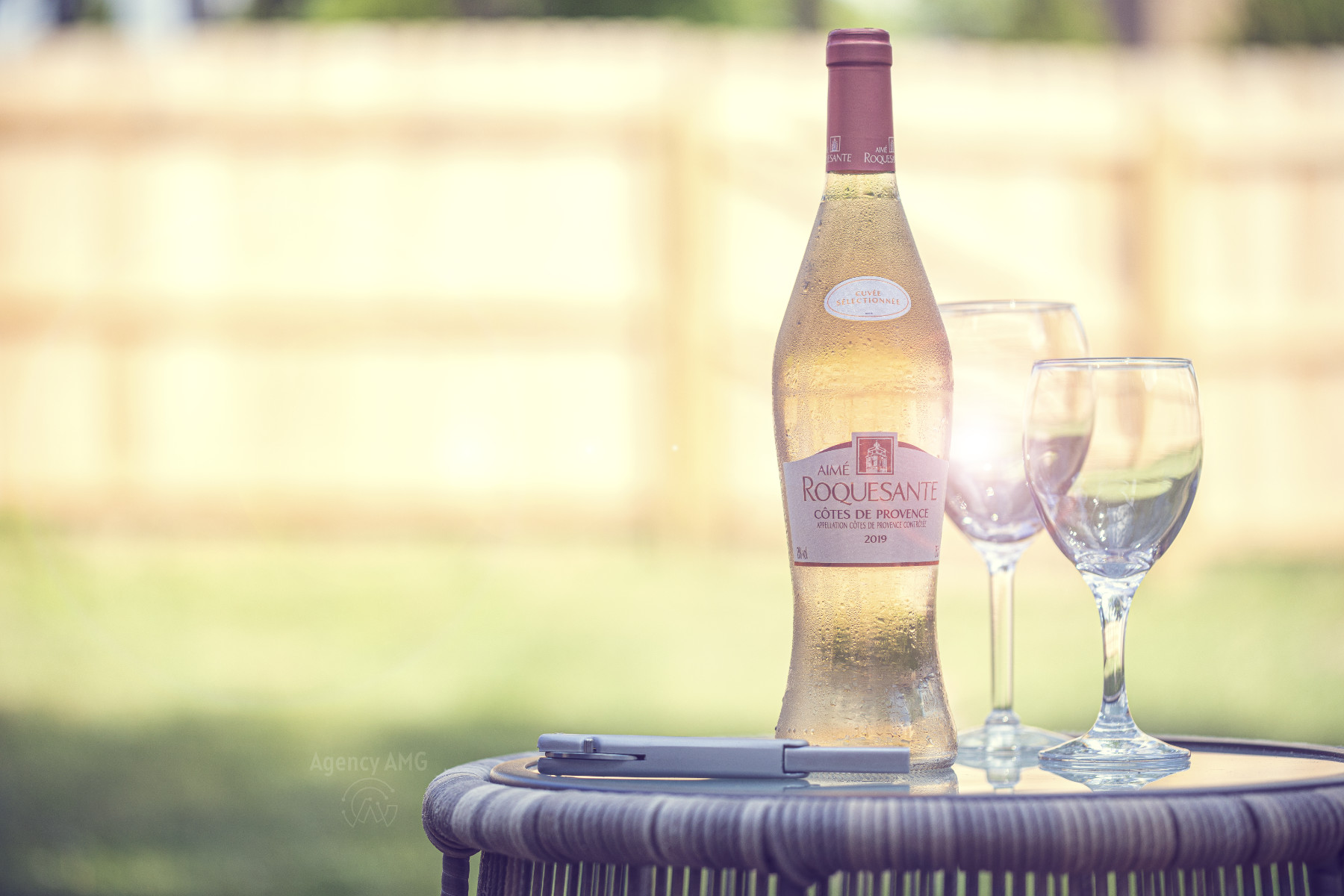 Red wine pour into stemware with rich highlights